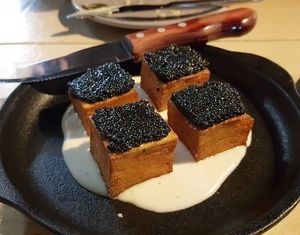 Potato pavé with seaweed caviar and parmesan veloute at Smith & Daughters in Collingwood