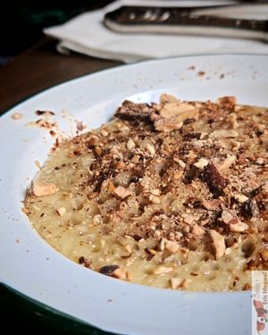 Baghrir pancakes, the famous pancakes with a thousand holes, served with orange blossom agave syrup and roasted almonds at La Cuisine de Souad @ Ernest & Souad in Paris