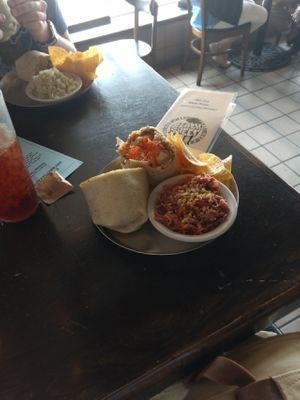 1/2 General Tso and 1/2 Thai burritos at Black Sheep Burrito and Brews in Huntington