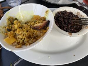 Curry tofu burrito bowl with a side of black beans  at Black Sheep Burrito and Brews in Huntington