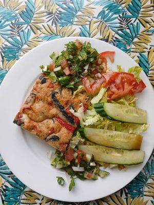 Frittata served with a side salad. at Dove Cafe in St Leonards