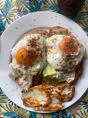 Za'atar fried eggs on sourdough toast with avocado. at Dove Cafe in St Leonards