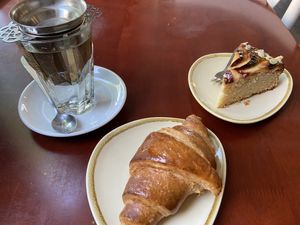 Croissant (great!) and apple-almond cake (a bit dry) at Koffie ende Koeck in Amsterdam