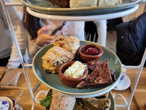 Afternoon tea, middle layer: scones with butter and jam, brownie at Koffie ende Koeck in Amsterdam