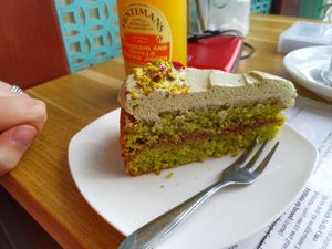 Pistachio cake with raspberry jam and matcha frosting at Koffie ende Koeck in Amsterdam