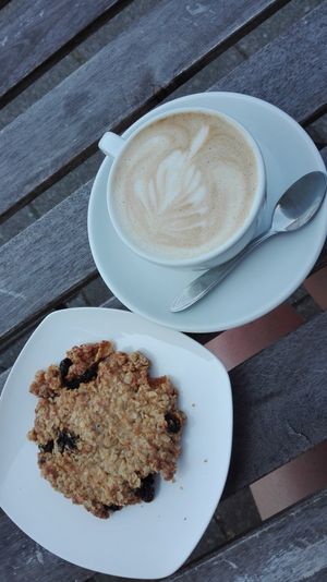 Cappuccino with Oatly oatmilk and a cookie with raisins and lavender :) at Koffie ende Koeck in Amsterdam