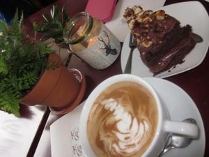 Delicious chocolate & nuts cake with chai latte at Koffie ende Koeck in Amsterdam