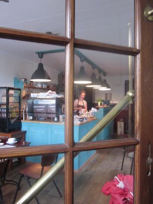 Looking into the cafe from the cute separate foyer... at Koffie ende Koeck in Amsterdam