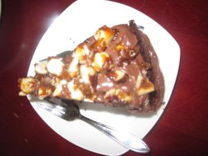 Chocolate nut cake... rich, moist, creamy frosting, nuts....delicious... at Koffie ende Koeck in Amsterdam