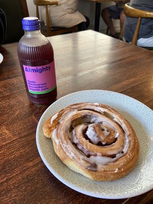 Cinnamon scroll and juicee  at Crater Cafe Akaroa in Akaroa