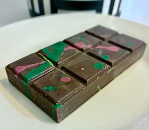 Pistachio kunafa chocolate bar  at Innocent Sweets in Dubai