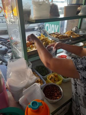 Preparing my food at Quán Chay Xanh Vegan in Ho Chi Minh City