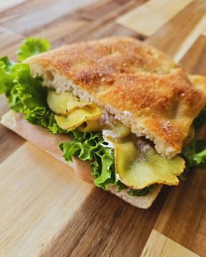 Arrosto in Fragranza: vegetable roast, smoked stracchino cheese, baked potatoes, and salad at Focacceria Cecino in Milan