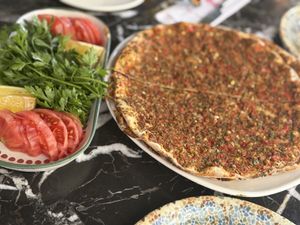 Vegan Lahmacun with tomatoes, herbs, Lemon and minced soy/ spices   at Casius Antioch Kitchen Restaurant in Istanbul