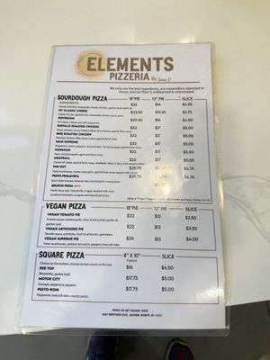 Regular non vegan menu with vegan pizza section  at Elements Pizzeria  in Jackson Heights
