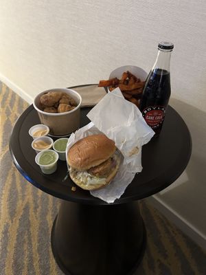 Greasy ‘chicken’ burger, floppy cold SPFs, poor tasting cauliflower bites and dodgy coke.   at HipCityVeg - University City in Philadelphia