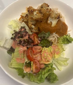 SOS GF pasta with marinara topped with roasted cauliflower, green salad with raspberry vinaigrette.  at Ian and Angela in Sedona