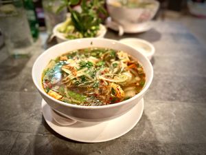 Which flavorful vegan pho, so good I didn’t have to add any Sriracha or other sauce    at Tin Corner in Frederick