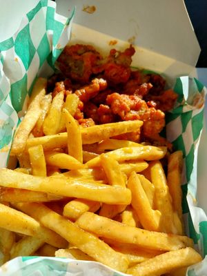 buffalo wings & fries with cheese sauce at Dirty Vegan Shack in St Louis