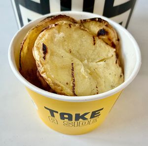 Roasted sliced potatoes  at Malak Al Tawouk - Motor City in Dubai