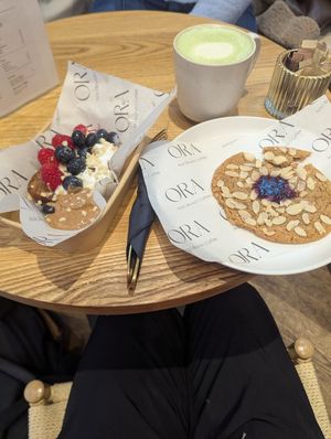 Banana bread and cherry almond cookie. And salted pistachio matcha latte! at ORA Wellness Cafe in Norwich