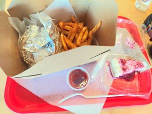 Good portions. Large sandwich and way more fries than it looks like. Awesome cheesecake 😋 at Rhythm 'n Wraps in Boston