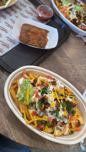 Loaded fries & cheeseburger eggrolls!  at Rhythm 'n Wraps in Boston