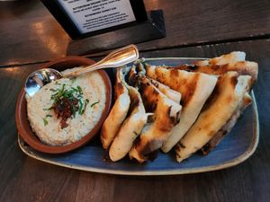 Rosted eggplant hummus and sourdough flatbread at Von's 1000 Spirits in Seattle