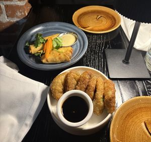 Chive Dumplings (on the bottom)  at Hobgoblin - Gastropub in Boston