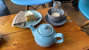 Tea, oat milk, vegan lemon cakee  at Devonmade in Paignton