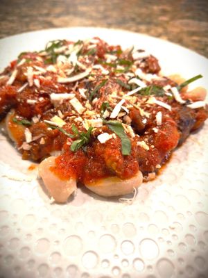 Hand-made Vegan Cavatelli alla Norma topped with house-made cashew cheese at Mondano in Old Forge