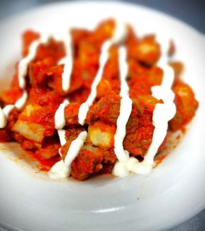 Spanish Patatas Bravas with a drizzle of Vegan Crema at Mondano in Old Forge