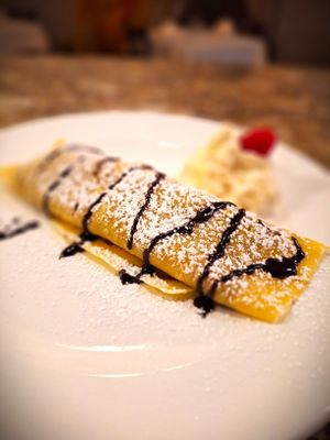 Vegan and Gluten-Free Fruit Crepe made with lentil-based whipping cream at Mondano in Old Forge