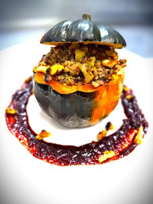 Stuffed Acorn Squash with Maple-Cranberry Gastrique at Mondano in Old Forge