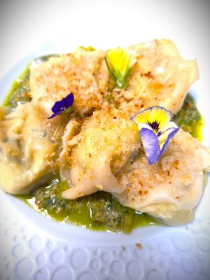 Hand-made Vegan Cappellacci filled with Herbed Summer Squash and served with Walnut Pesto and Lemon Focaccia Crumbs at Mondano in Old Forge