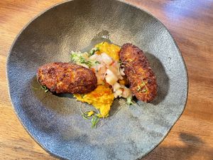 Acarajé with peanut vatapá and pineapple. Amazing! at Gaia Art and Cafe in Rio De Janeiro