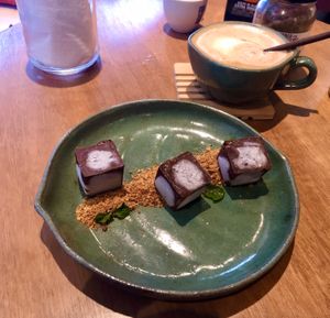 Frozen Chocolate Cubes with Almond Crumbles at Gaia Art and Cafe in Rio De Janeiro