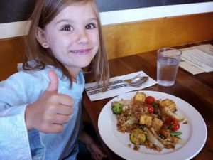 A happy customer eating the Thai Grille Fried Rice with Tofu. at Thai Grille in Westerville