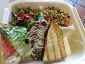 Delicious portobello mushroom sandwich with salad, brown rice at The New Vegan in Delray Beach
