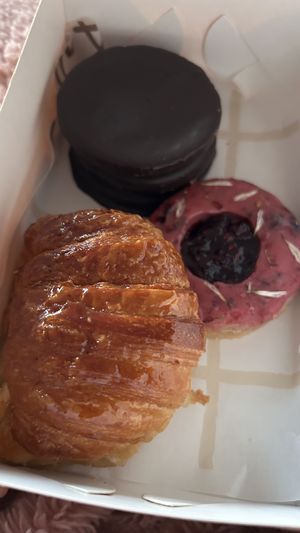 Alfajor surprise, espejito relleno de frutos rojos, medialuna   at Ventanin in Montevideo