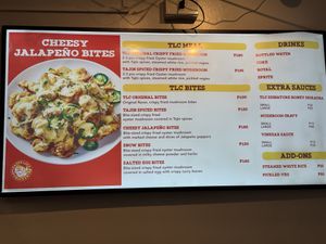 Only “original” and “spiced” flavors are vegan. Pickled veggies, gravy, and vinegar sauce also vegan.  at Taste Like Chicken in Baguio City