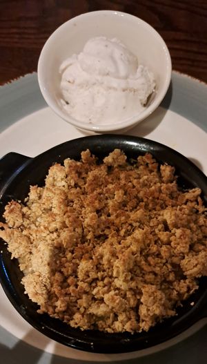 Apple crumble with vegan ice cream at Caledonian Hotel in Leven