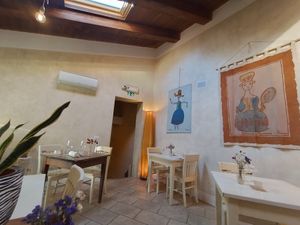 one corner of one of the upstairs rooms at Il Lavatoio Bistrot in Santarcangelo Di Romagna