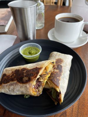 The amazing breakfast burrito and Americano coffee.  at Eats Bakery in Salt Lake City