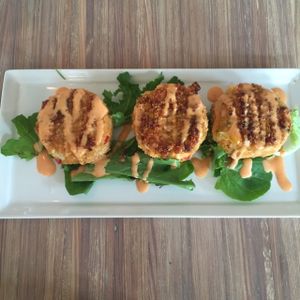 appetizer: artichoke&hearts of Palm cakes--to die for!! at Seed - Faubourg Lafayette in New Orleans