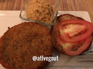 coconut burger with chickpea salad at Seed - Faubourg Lafayette in New Orleans