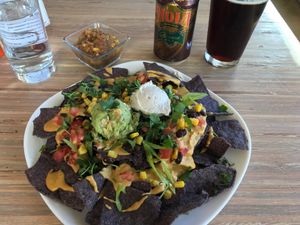 Nachos and local NOLA beer at Seed - Faubourg Lafayette in New Orleans