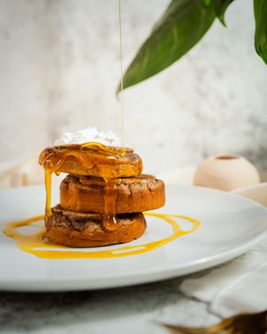 Fluffy vegan protein pancakes made with plant power - perfect for a tasty, guilt-free boost! at PLANT THEORY - The Vegan Restaurant in Canggu