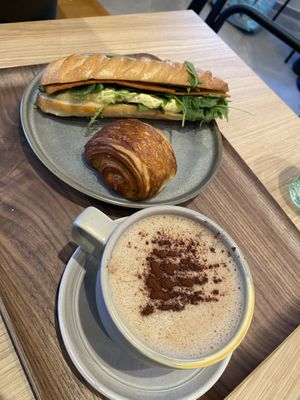 Tofu mimosa sandwich? Pan au chocolat (mini) and coffee.    at Land & Monkeys - Père Lachaise   in Paris