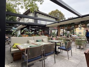 Outdoor seating area  at Restavracija Al Fresco in Bled
